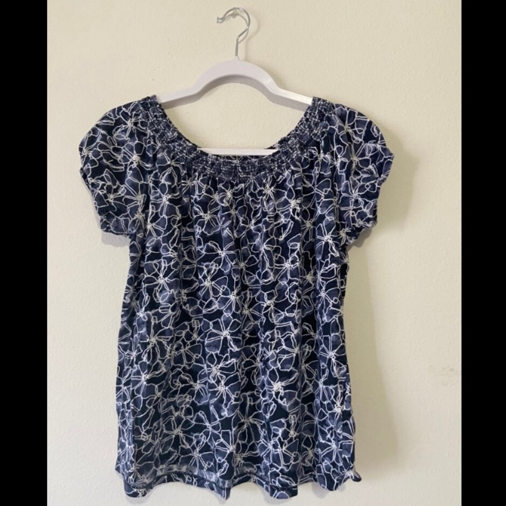 White and blue floral blouse
